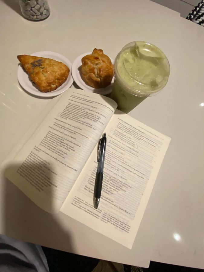 Blue Door has the perfect space for studying. Pictured is their spinach puff, honey, cinnamon scone, and shaken matcha.