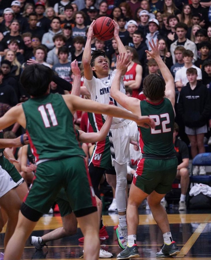 Senior Darel Reece scores 12 points during the Cavaliers 54-49 victory over the Highlanders.