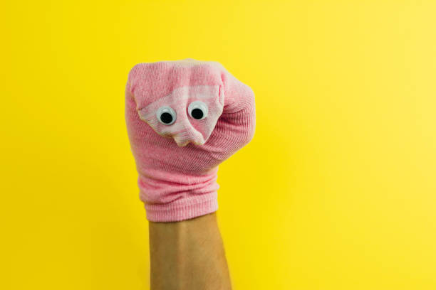 https://media.istockphoto.com/photos/funny-doll-sock-with-googly-eyes-on-a-yellow-background-picture-id1154903435?b=1&k=20&m=1154903435&s=612x612&w=0&h=1R9OC5Pd6YXsDAAVhUW_wcL-8fHR4HJgjseiEvzPFk8=