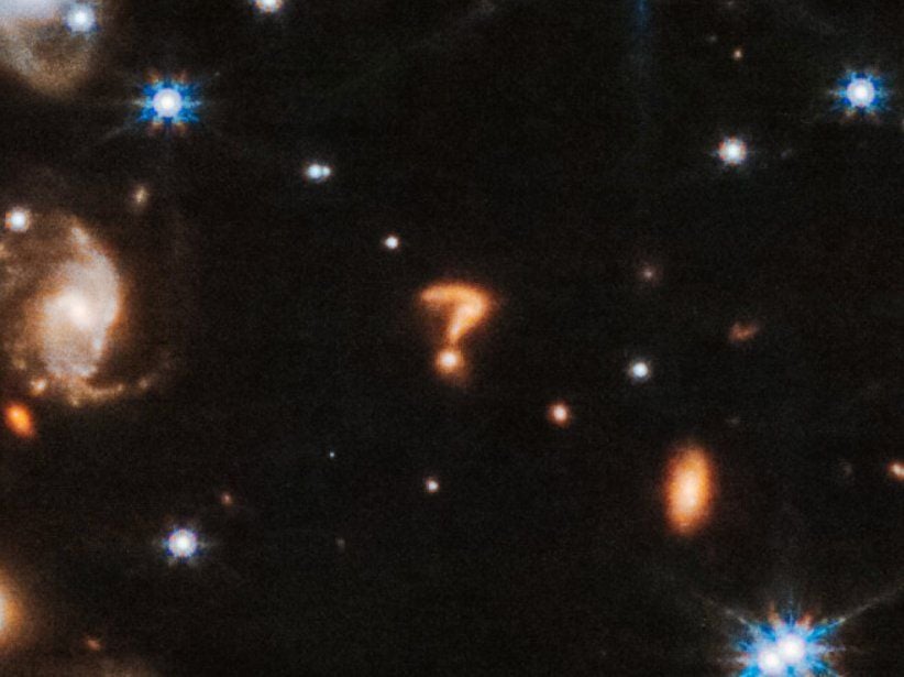 Photograph taken of question mark from James Webb Space Telescope
