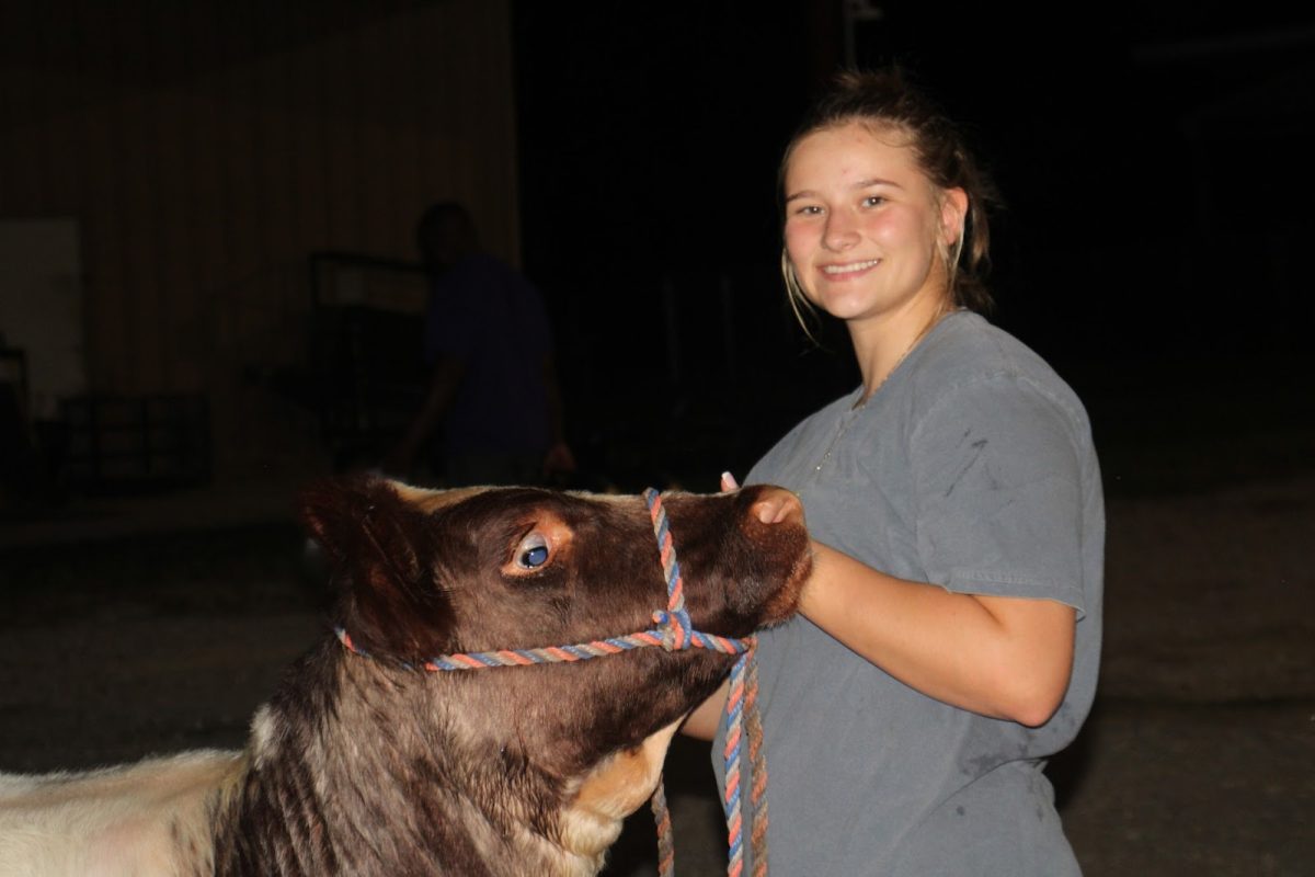 Callie Whippo and her Cow